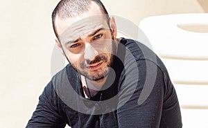 Portrait of a handsome Italy man face outdoors