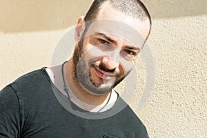 Portrait of a handsome Italy man face outdoors