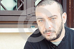 Portrait of a handsome Italy man face outdoors