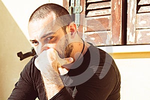 Portrait of a handsome Italy man face outdoors