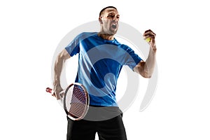 Portrait of a handsome male tennis player celebrating his success isolated on a white background