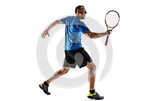 Portrait of a handsome male tennis player celebrating his success isolated on a white background