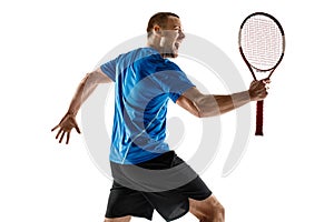 Portrait of a handsome male tennis player celebrating his success isolated on a white background