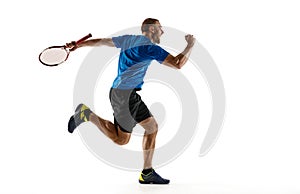 Portrait of a handsome male tennis player celebrating his success isolated on a white background