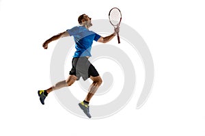 Portrait of a handsome male tennis player celebrating his success isolated on a white background