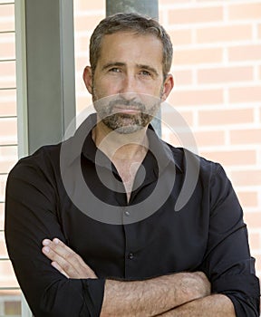 Portrait of handsome man in black shirt