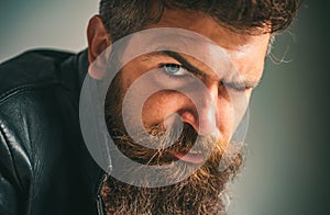 Portrait of handsome man. Close up portrait of guy with serious face. Mafia boss.