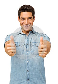 Portrait Of Handsome Man Gesturing Thumbs Up
