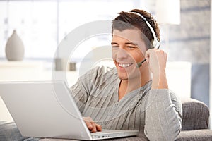 Portrait of handsome man with headset