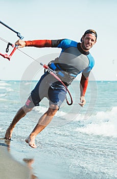 Portrait of handsome man kitesurfer