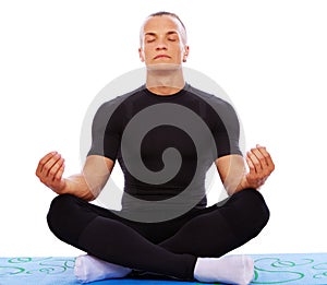 Portrait of handsome man posing in studio on white background