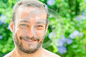 Portrait Of A Handsome Man Smiling At The Camera