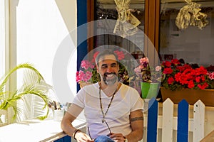 portrait of handsome man smiling at camera