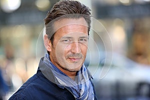 Portrait of handsome man wearing accessories