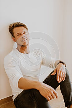 portrait of handsome man wearing casual at home