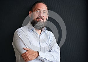 Portrait of handsome mature man with silvering beard