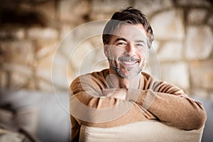 Portrait Of A Handsome Mature man smiling.