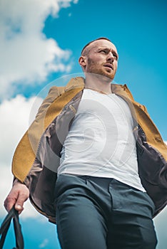 Portrait of handsome readhead man. Stylish young man looking away.