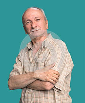 Portrait of handsome senior man looking at the camera