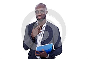 Handsome serious adult businessman holding mobile phone and clipboard