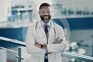 Portrait of handsome smiling african american doctor