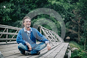 Portrait of handsome smiling man outdoor