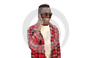 Portrait of handsome smiling young african man calling on smartphone isolated on white background