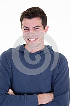 Portrait of handsome smiling young man laughing joyful cheerful boy studio shot isolated on white background
