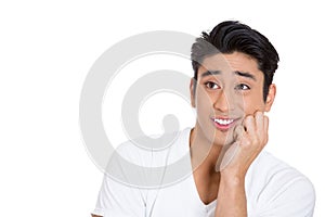 portrait of a handsome smiling young man, student, worker, daydreaming, isolated on white background