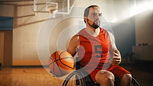 Portrait of Handsome Wheelchair Basketball Player Wearing Red Shirt Dribbling Ball, Ready to Shoot