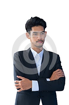 Handsome young businessman standing arms crossed isolated on white background