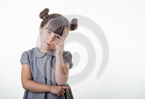 Portrait of handsome young girl with inspired facial expression who just has got an idea.