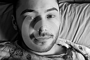 Young boy relaxed on the bed