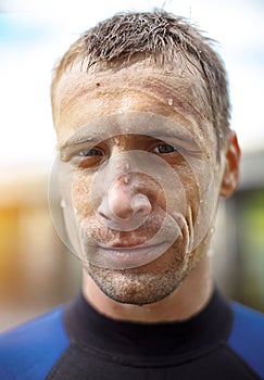 Portrait of a handsome young man in diving suit