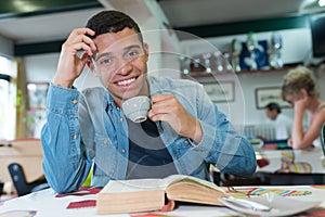 portrait handsome young man drinking coffee