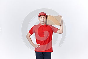 Portrait of a handsome young man holding card boxes, isolated on white