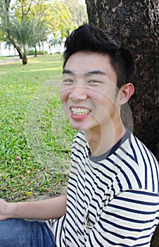 Portrait of a handsome young man posing outdoor.