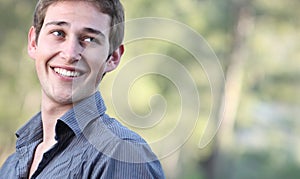 Portrait of a handsome young man smiling