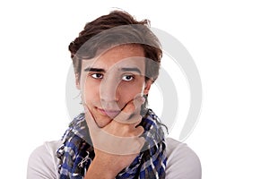 Portrait of a handsome young man thinking