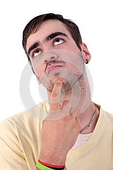 Portrait of a handsome young man thinking