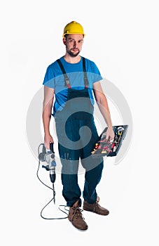 Portrait of a handyman holding toolbox and drill