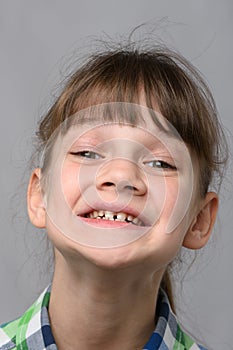 Portrait of the happiest ten-year-old girl of European appearance, close-up