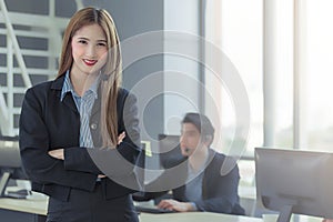 Portrait of happiness young asain girl working at a call center