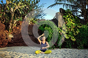 Portrait of happiness young woman practicing yoga on outdoors.Yoga and relax concept. Beautiful girl practice asana