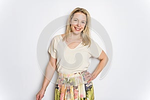 Portrait of happy 40 woman over white background