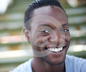 Portrait of a happy africa american man smiling outdoors