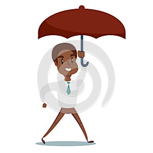 Portrait of a happy African American businessman holding umbrella