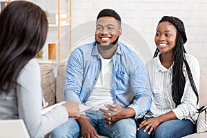 Portrait Of Happy African American Couple After Successful Marital Therapy Session