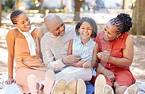 Portrait happy african american family of four spending quality time together in the park during summer. Grandparents