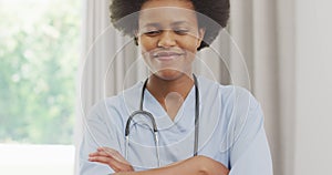 Portrait of happy african american female doctor looking at camera and smiling